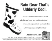 B&W newspaper advertisement featuring child's Wellington boots in Jersey Cow pattern, with headline "Rain Gear That's Udderly Cool."
