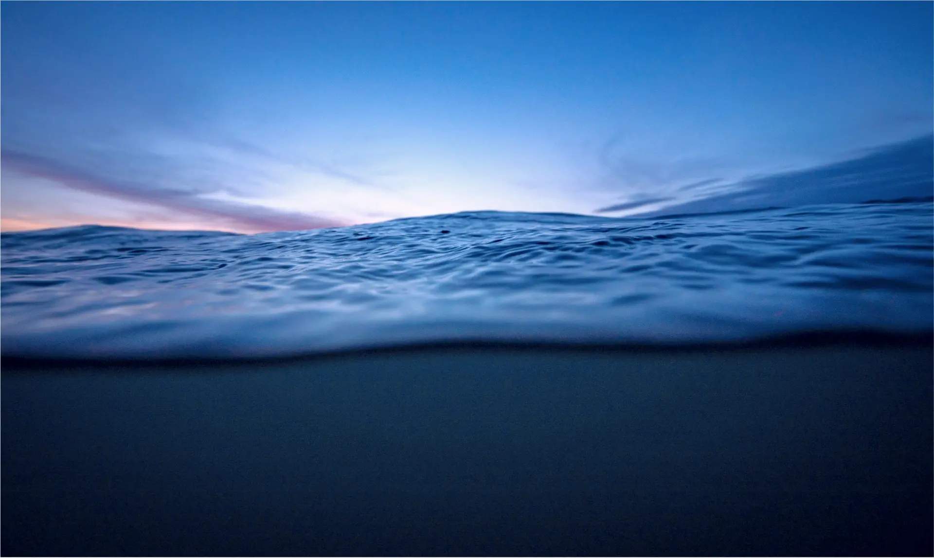 Dramatic wave with sunset sky